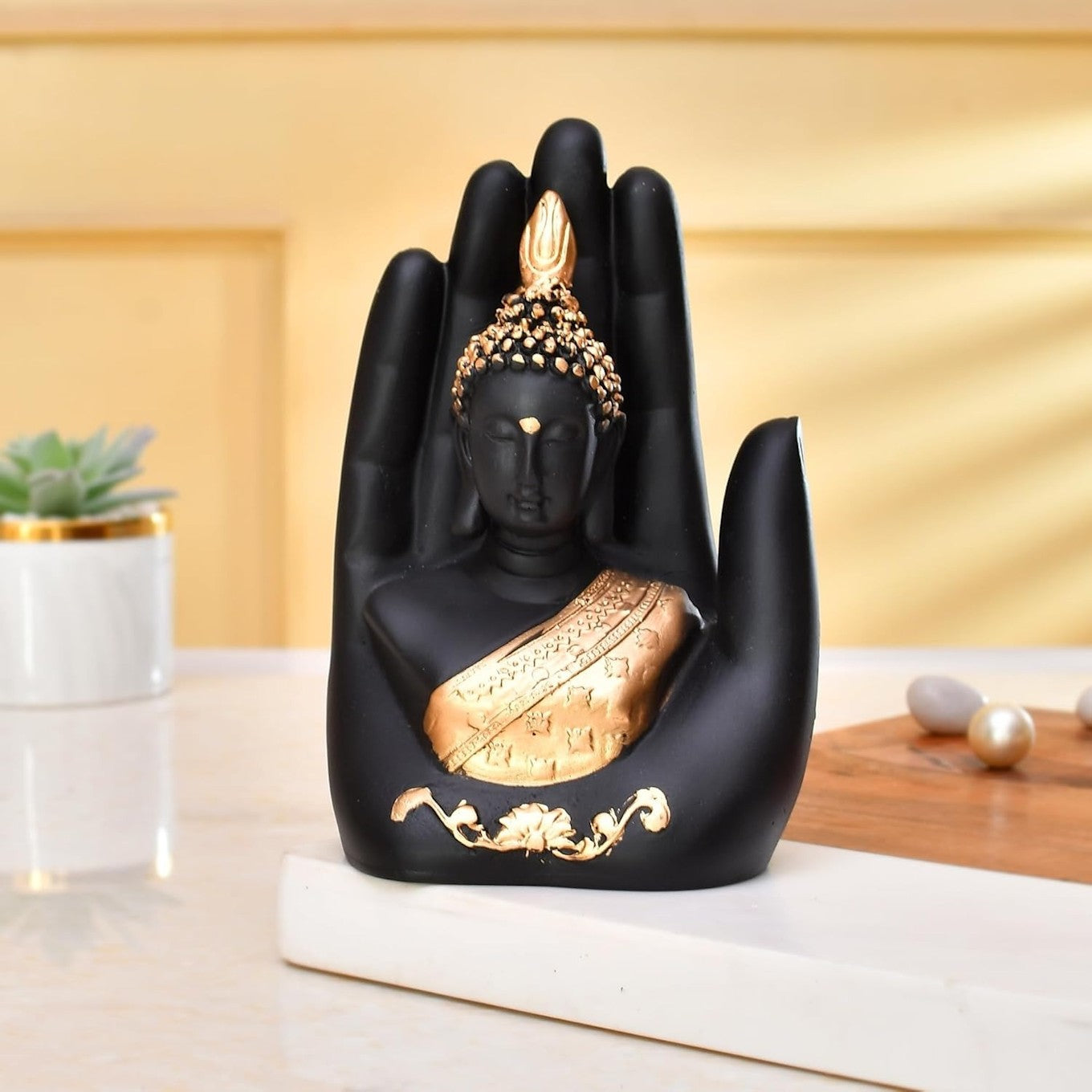 Decorative Buddha Face in Hand Showpiece – Black and Gold Spiritual